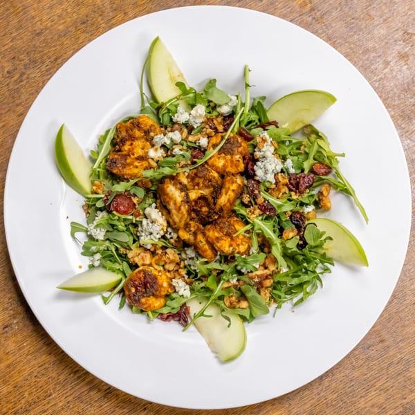 Murray's Restaurant & Deli's chicken salad with arugula, green apple slices, blue cheese, and walnuts.